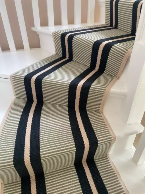 PNT28 flatweave stair runner on white wooden staircase