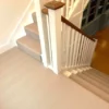 Kelly Solid KS01 flatweave stair runner on white staircase